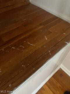 room details with wood finished floors and baseboards