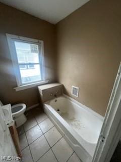 952 Whitby Rd, Cleveland Heights, OH 44112 - full bathroom featuring tile patterned flooring, toilet, and a bath