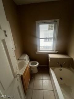 952 Whitby Rd, Cleveland Heights, OH 44112 - full bathroom with a tub to relax in, toilet, tile patterned flooring, and vanity