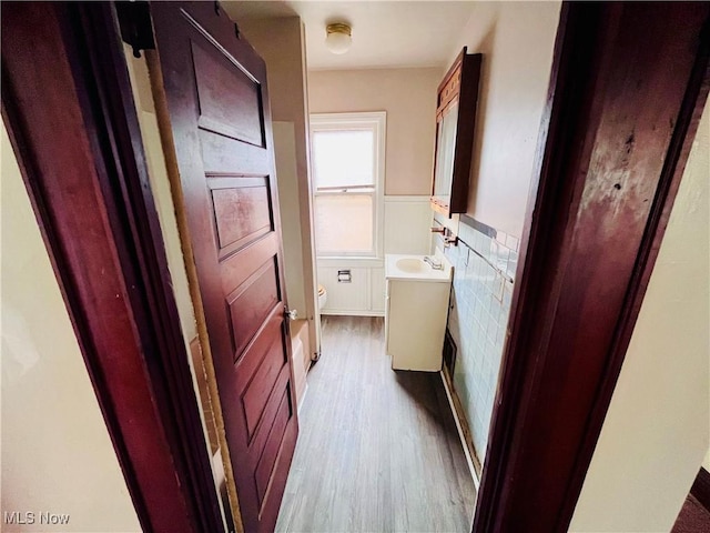 406 Grant St, Newell, WV 26050 - bathroom featuring vanity, a wainscoted wall, toilet, and wood finished floors