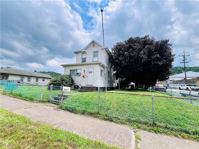 319 Grant St, Newell, WV 26050 - traditional-style house featuring a fenced front yard and a gate