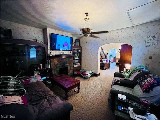 319 Grant St, Newell, WV 26050 - carpeted living room with wallpapered walls, a ceiling fan, attic access, and a fireplace