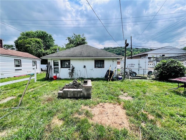 319 Grant St, Newell, WV 26050 - rear view of house with stucco siding and a shingled roof