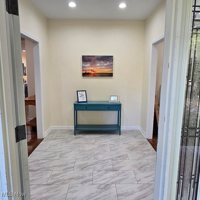 115 Beech St, Kelleys Island, OH 43438 - hall with recessed lighting, baseboards, and marble finish floor