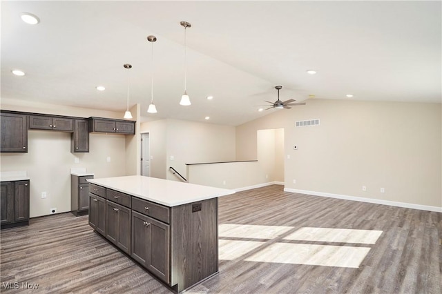 5058 Catawba Place Ln, Seville, OH 44273 - kitchen featuring visible vents, dark brown cabinetry, ceiling fan, and vaulted ceiling