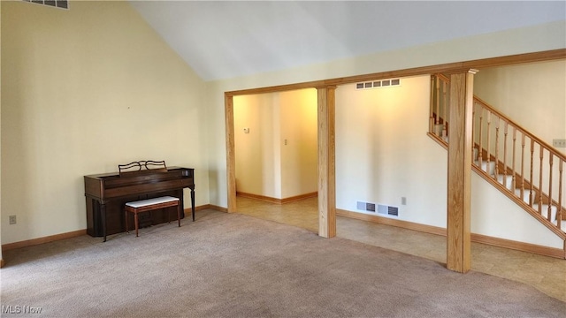 11466 Bloom Rd, Garrettsville, OH 44231 - carpeted living area with lofted ceiling, baseboards, and stairway