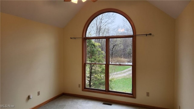 11466 Bloom Rd, Garrettsville, OH 44231 - carpeted spare room with vaulted ceiling, baseboards, and ceiling fan