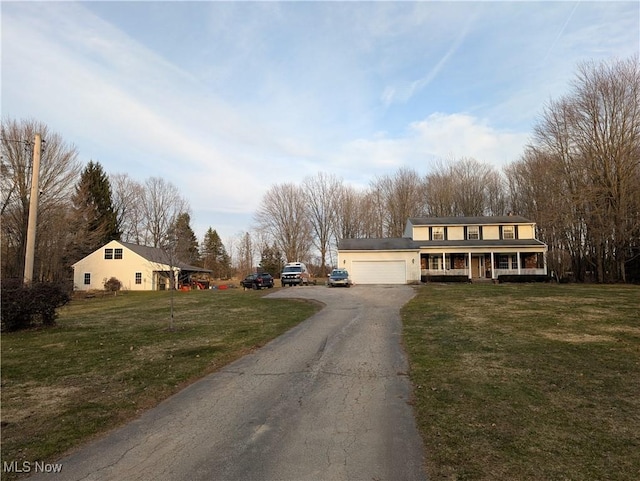 view of road featuring aphalt driveway