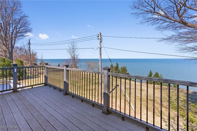 1122 Lake Rd, Conneaut, OH 44030 - wooden terrace with a water view