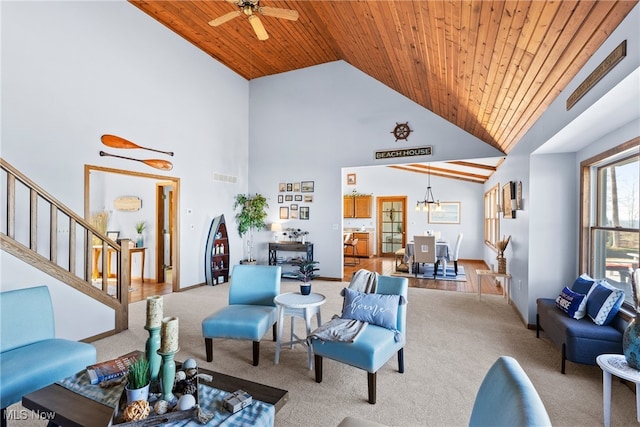 1122 Lake Rd, Conneaut, OH 44030 - living area with visible vents, stairway, wood ceiling, and carpet flooring