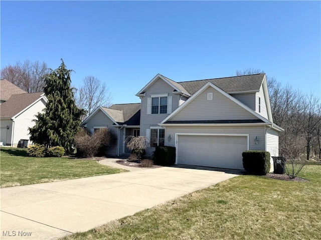 33 Mallards Xing, Canfield, OH 44406 - traditional-style house featuring a front lawn, driveway, a shingled roof, and a garage