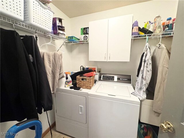 33 Mallards Xing, Canfield, OH 44406 - clothes washing area featuring cabinet space and washer and dryer