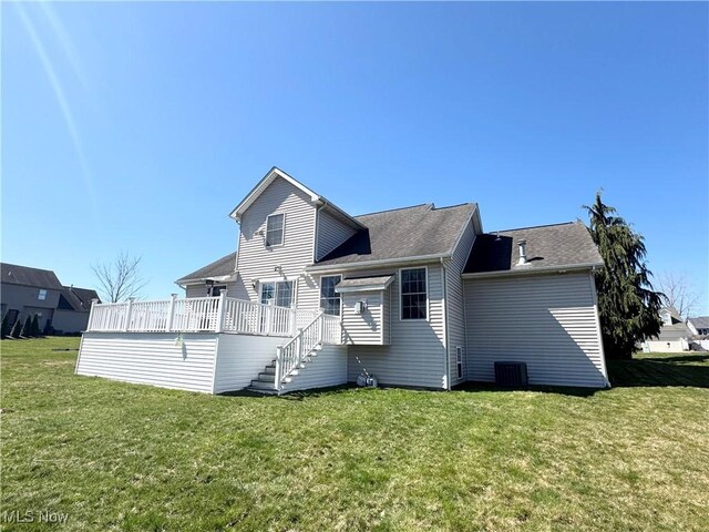 33 Mallards Xing, Canfield, OH 44406 - rear view of property with stairs, central AC, a deck, and a yard