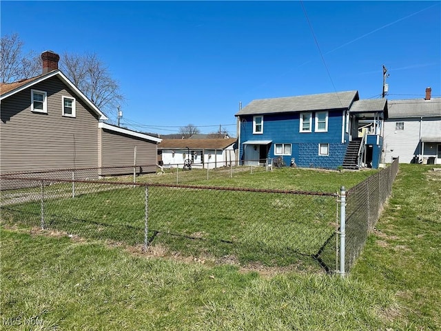 87R 26th St, Wellsburg, WV 26070 - back of property with a fenced backyard and a yard