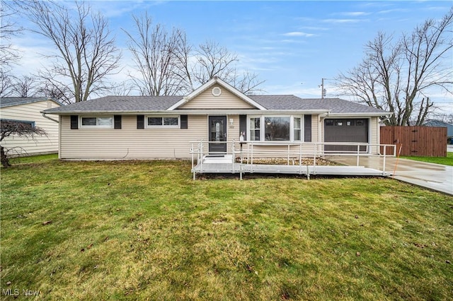 7452 Goldenrod Dr, Mentor-On-The-Lake, OH 44060 - ranch-style house with a front lawn, fence, driveway, and an attached garage