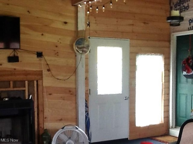 278 W Main St, Andover, OH 44003 - entryway featuring wood walls and healthy amount of natural light