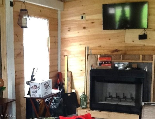 278 W Main St, Andover, OH 44003 - living area with wooden walls and a fireplace