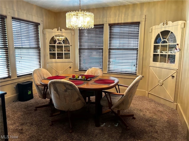1275 Hollywood, Warren, OH 44483 - carpeted dining space featuring a chandelier