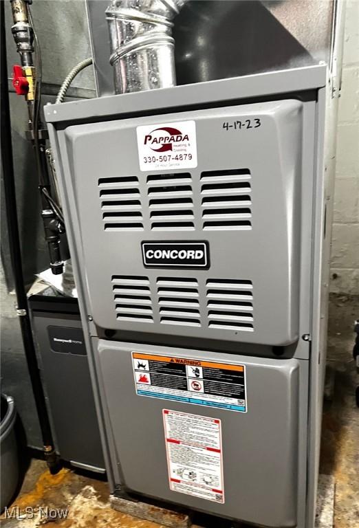 1275 Hollywood, Warren, OH 44483 - utility room featuring heating unit