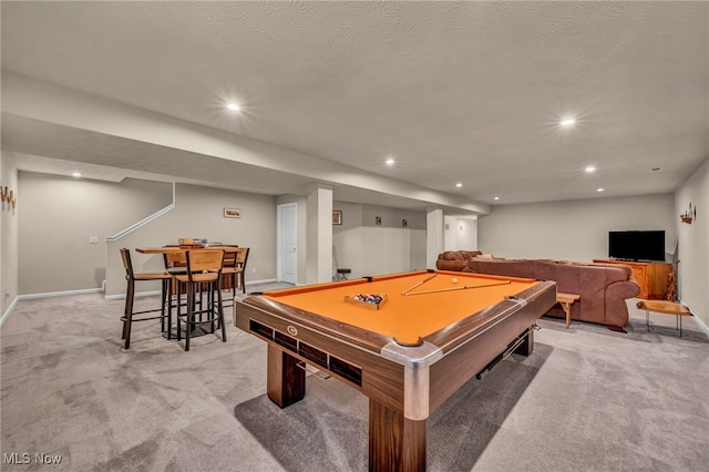 recreation room featuring baseboards, recessed lighting, and light colored carpet
