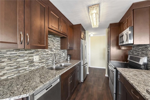 12520 Edgewater Dr Unit 905, Lakewood, OH 44107 - kitchen with a sink, tasteful backsplash, light stone countertops, stainless steel appliances, and dark wood-style flooring