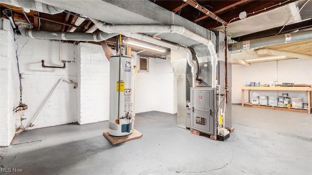unfinished basement featuring water heater and heating unit