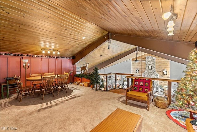 dining area with rail lighting, carpet flooring, lofted ceiling, and wooden ceiling