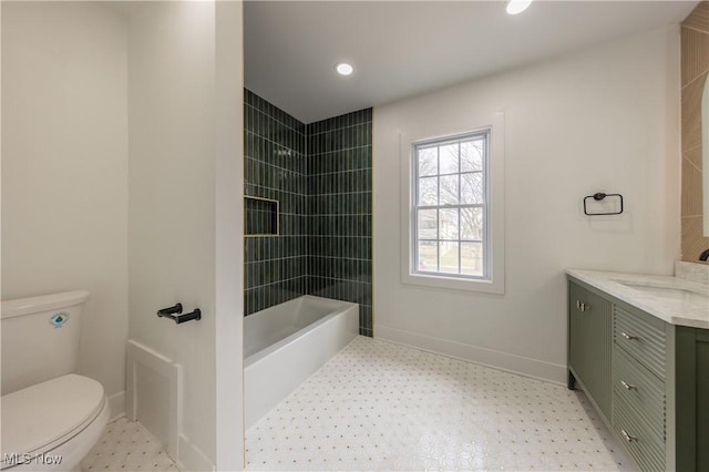bathroom with toilet, vanity, bathing tub / shower combination, baseboards, and recessed lighting