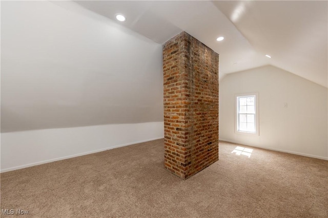 bonus room with lofted ceiling, recessed lighting, and carpet flooring