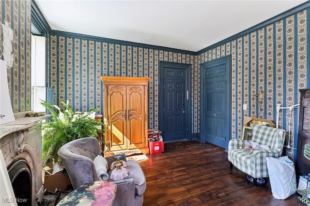 500 S Main St, Poland, OH 44514 - living area featuring wallpapered walls, ornamental molding, and wood finished floors