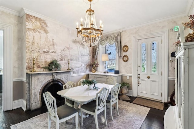500 S Main St, Poland, OH 44514 - dining area with dark wood-style flooring, a notable chandelier, and crown molding