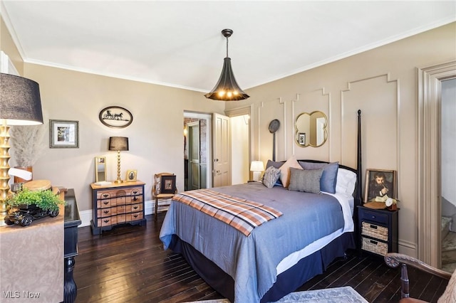 500 S Main St, Poland, OH 44514 - bedroom featuring dark wood-style floors, crown molding, and baseboards