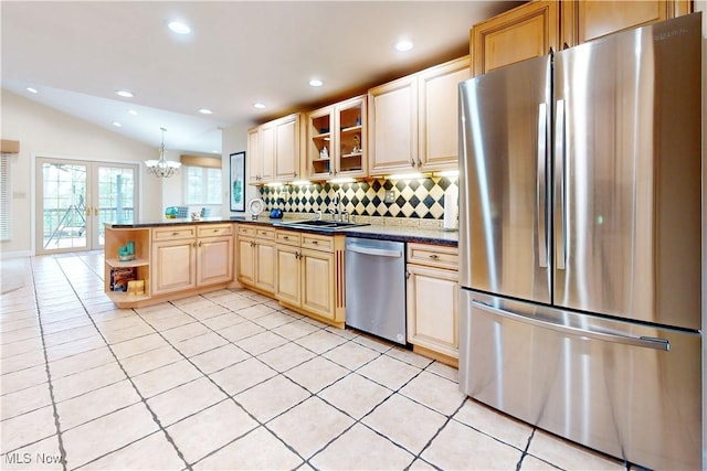 kitchen with light tile patterned flooring, decorative backsplash, dark countertops, appliances with stainless steel finishes, and open shelves
