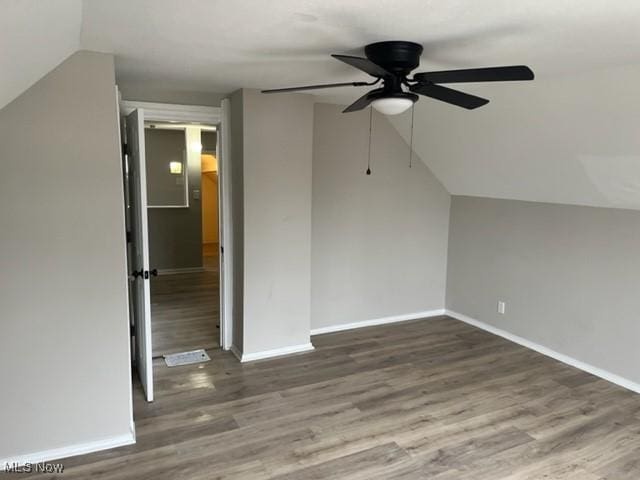 1900 Lamoille Ct, Cleveland, OH 44113 - bonus room featuring a ceiling fan, lofted ceiling, wood finished floors, and baseboards