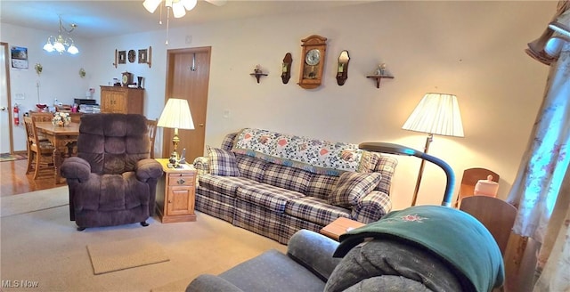 living area with a ceiling fan