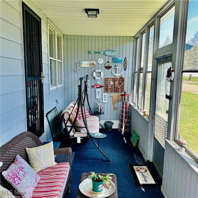 sunroom featuring a wealth of natural light