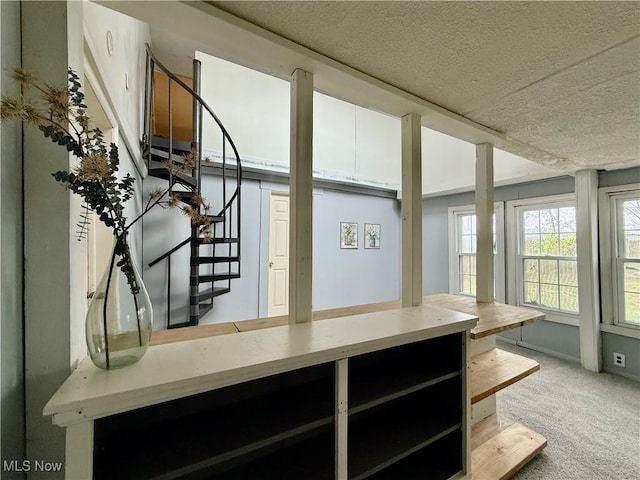 831 Fairview Ave, Parkersburg, WV 26101 - interior space with a textured ceiling, white cabinetry, and carpet