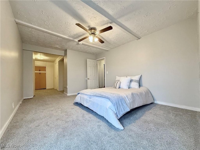 831 Fairview Ave, Parkersburg, WV 26101 - bedroom with baseboards, light colored carpet, and a textured ceiling