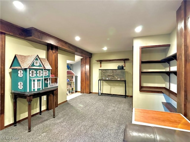 interior space with baseboards and recessed lighting
