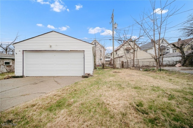 detached garage with fence