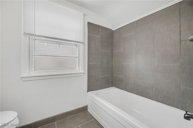 full bathroom featuring tile patterned floors, toilet, and baseboards