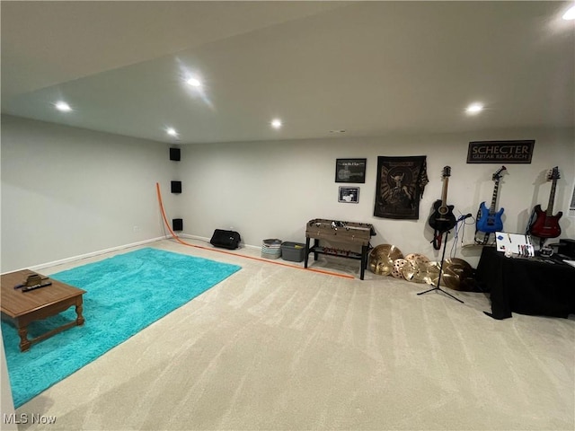 interior space with carpet floors, baseboards, and recessed lighting