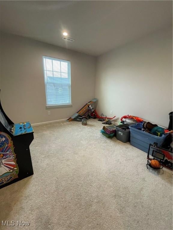 recreation room featuring recessed lighting, carpet flooring, and visible vents