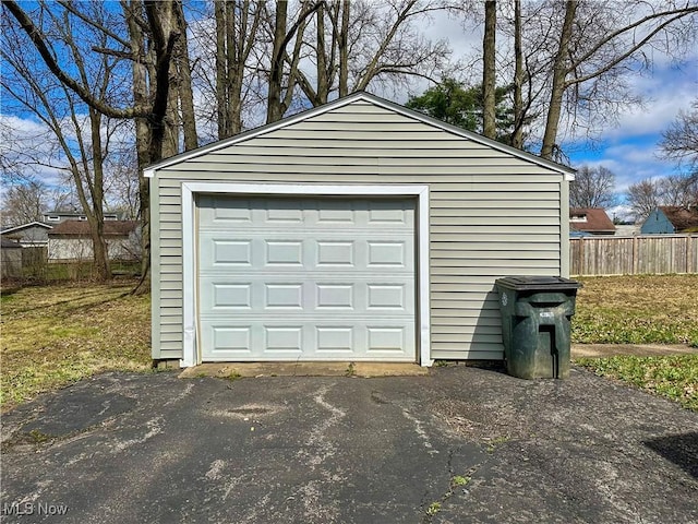1563 Maplewood St NE, Warren, OH 44483 - detached garage with aphalt driveway and fence