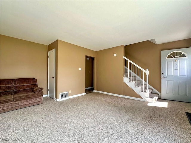1563 Maplewood St NE, Warren, OH 44483 - entrance foyer with baseboards, stairs, visible vents, and carpet floors