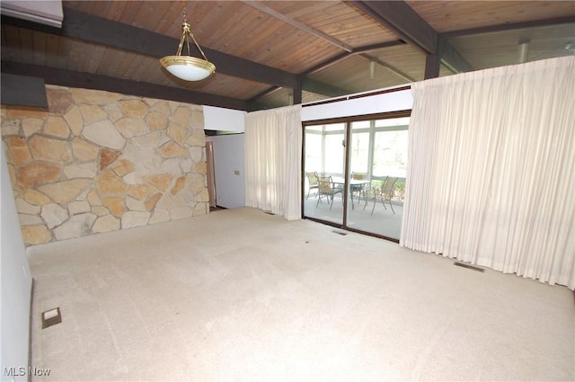 carpeted spare room with wood ceiling and vaulted ceiling with beams