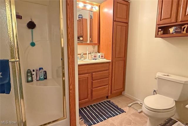 103 Southaven Ln, Kelleys Island, OH 43438 - bathroom with tile patterned floors, toilet, a stall shower, and vanity
