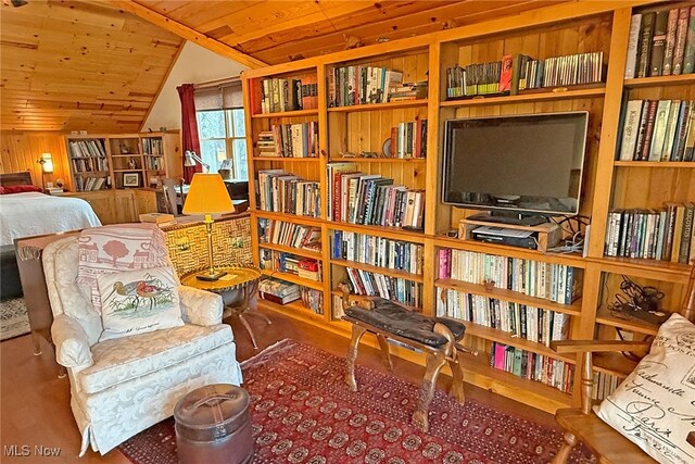 103 Southaven Ln, Kelleys Island, OH 43438 - sitting room featuring vaulted ceiling, wooden walls, and wood ceiling
