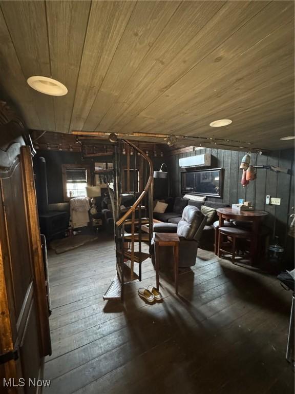 7301 Leafygreen St SW, Carrollton, OH 44615 - misc room with wooden ceiling, hardwood / wood-style flooring, and stairs