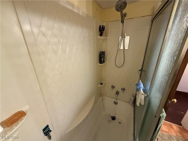 full bath featuring shower / washtub combination